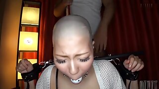 Japanese beauties lose their locks to pleasure, their heads shaved for ultimate arousal.